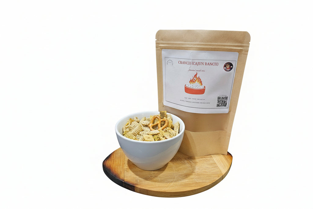 Bag of snack mix with a bowl of snacks on a wooden tray against a white background
